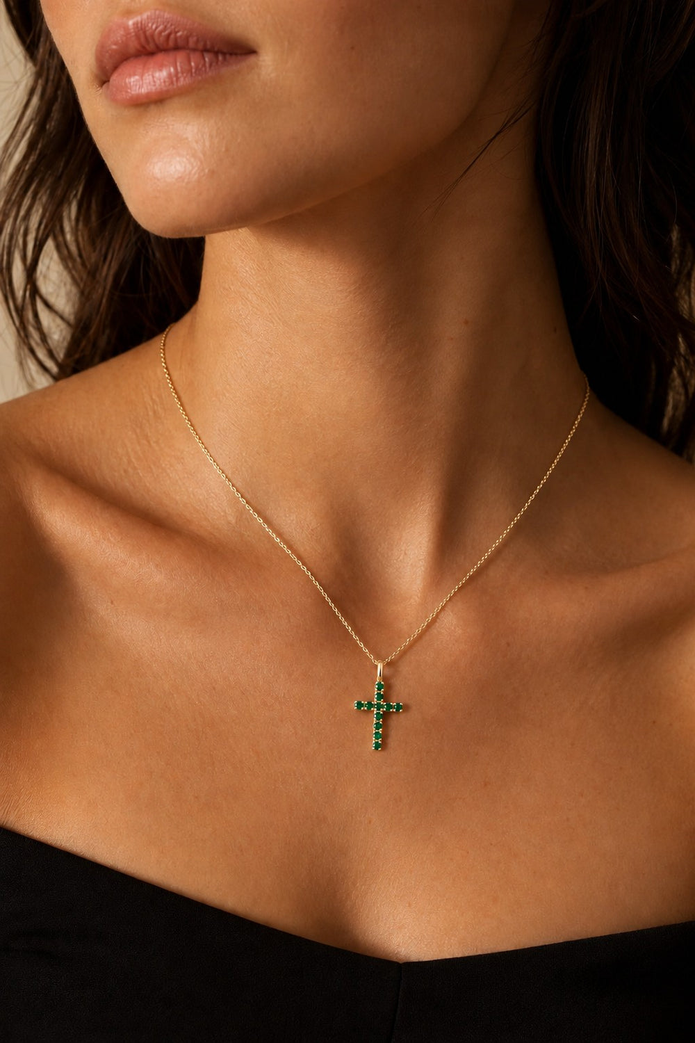Lab Emerald Cross Pendant — 0.80ctw worn on model in 14K Yellow Gold