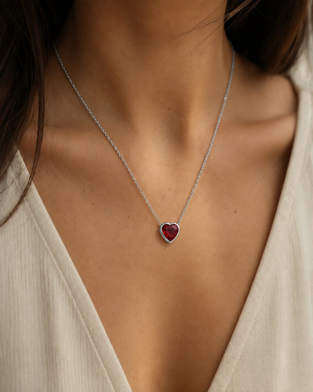 Bezel-Set Heart Lab Ruby Pendant — 2.50ct worn on model in 14K White Gold