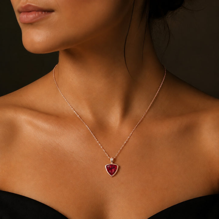 Bezel-Set Trillion Lab Ruby Pendant — 13mm worn on model in 14K Rose Gold
