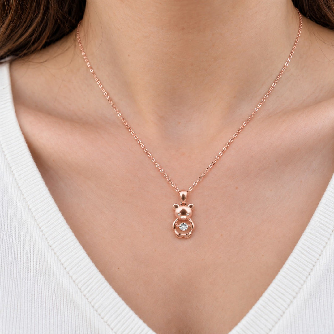 Bear Pendant with Dancing Lab Diamond worn on model in 14K Rose Gold