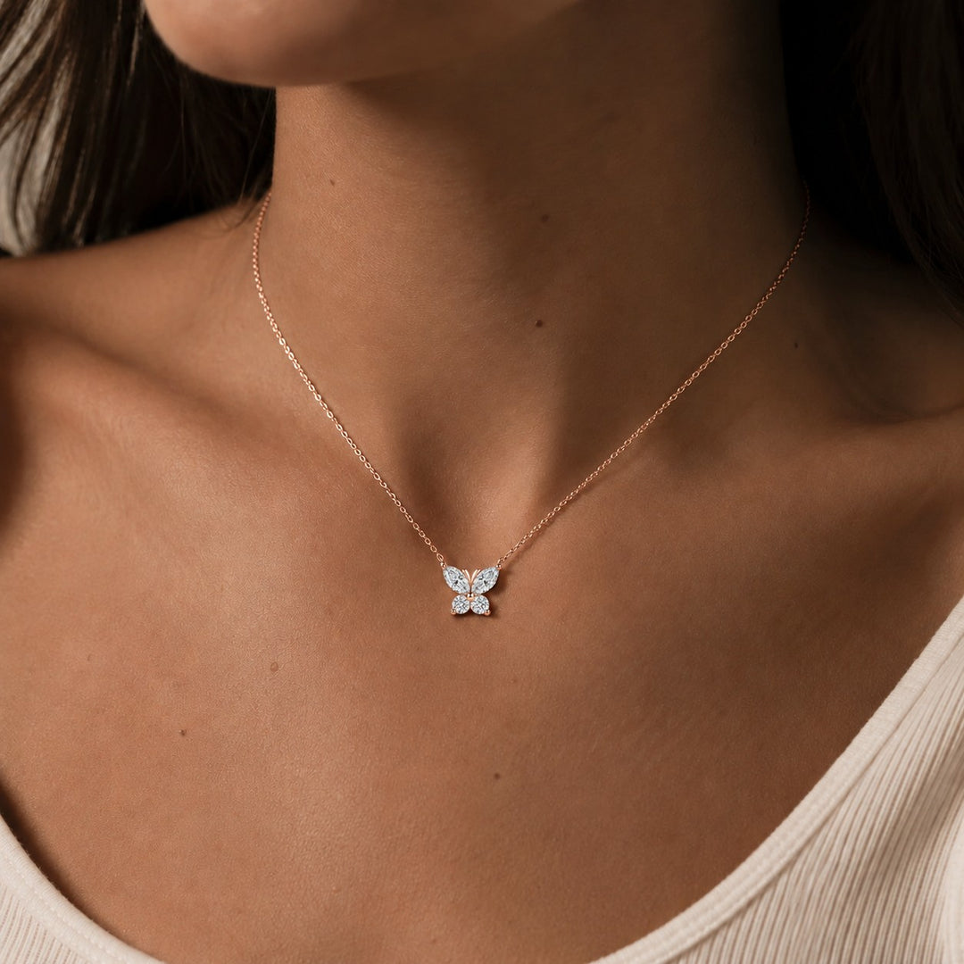 The Jardin Butterfly worn on model in 14K Rose Gold