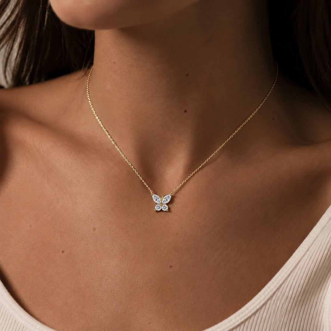 The Jardin Butterfly worn on model in 14K Yellow Gold