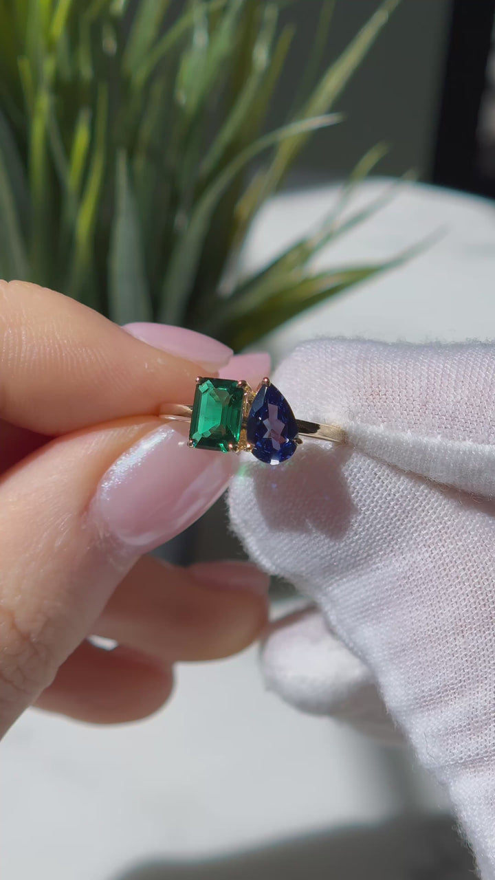 Customized™ 5x8mm, 1.00ct Pear Cut Blue Sapphire and 5x7mm, 1.19ct Emerald Cut Zambian Emerald Toi Et Moi Ring in Yellow Gold