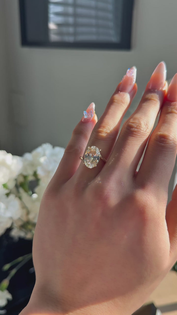 The Arcadia in 14K yellow gold — worn on the hand (far to close) [ld m=y shot=wear]