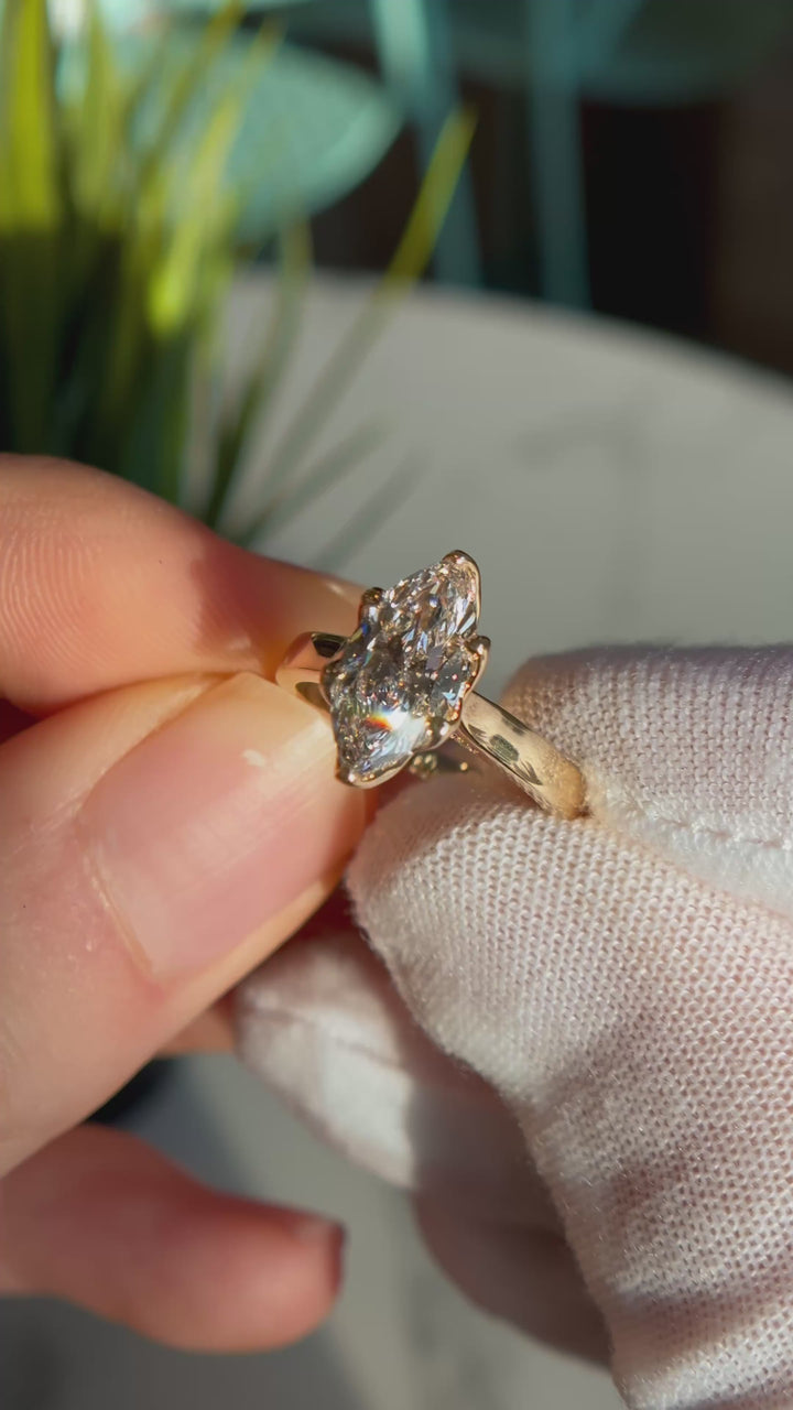 Customized™ 1.50ct Marquise Lab-Grown Diamond Solitaire Ring with Floral Prongs and Pavé Cathedral Bridge in Yellow Gold