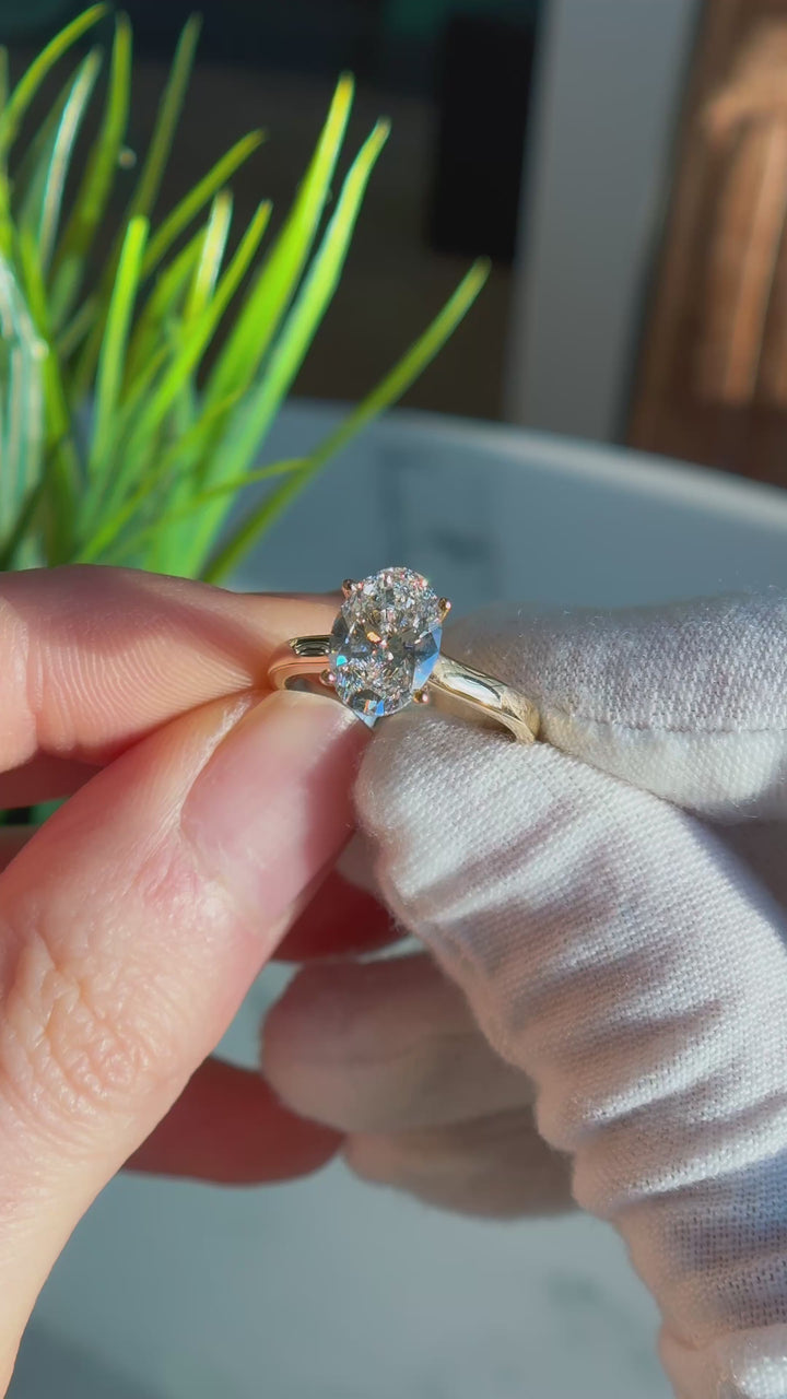 Customized™ 2.20ct Oval Lab-Grown Diamond Solitaire Ring with Hidden Halo and Pavé Cathedral in Yellow Gold