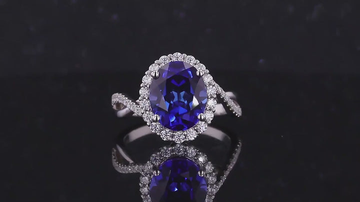 8x10mm, 4.00ct Oval Lab-Grown Blue Sapphire with Diamond Halo Ring/Twisted Band in 14K White Gold