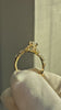 The Magnolia with a marquise center in 14K yellow gold — close-up detail [ld m=y shot=close]