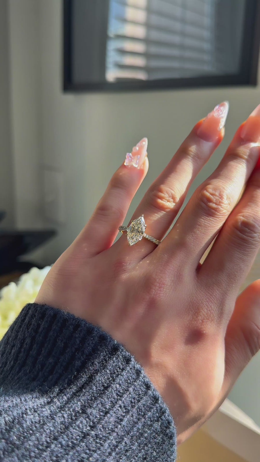 Lotus Lace Bold with a marquise center in 14K yellow gold — worn on the hand (far to close) [ld m=y look=marquise shot=wear]