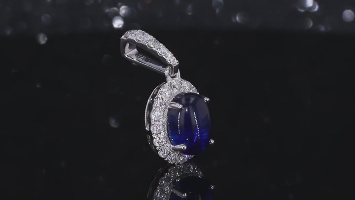 6x8mm, 1.80ct Oval Cabochon Lab-Grown Blue Sapphire with Diamond Halo Pendant in 14K White Gold