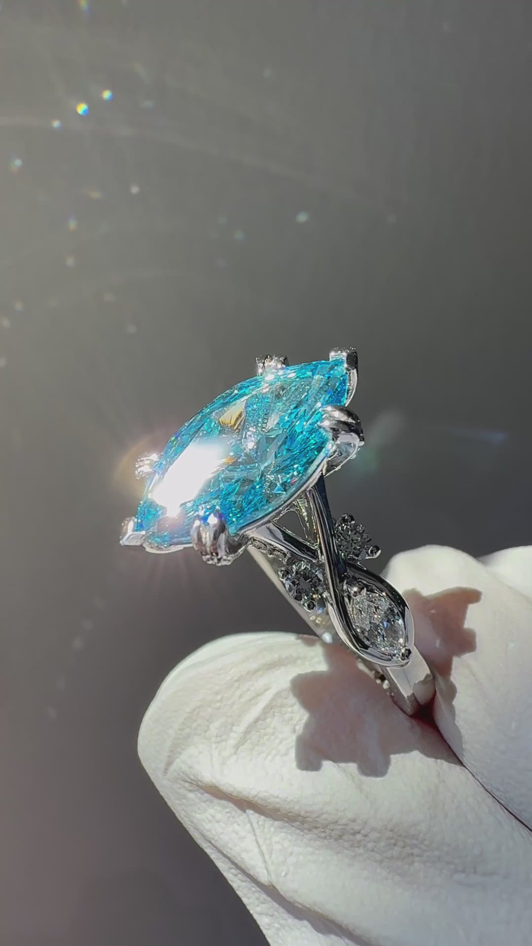 The Sovereign Crest blue diamond in 14K white gold — close-up detail [ld m=w shot=close]