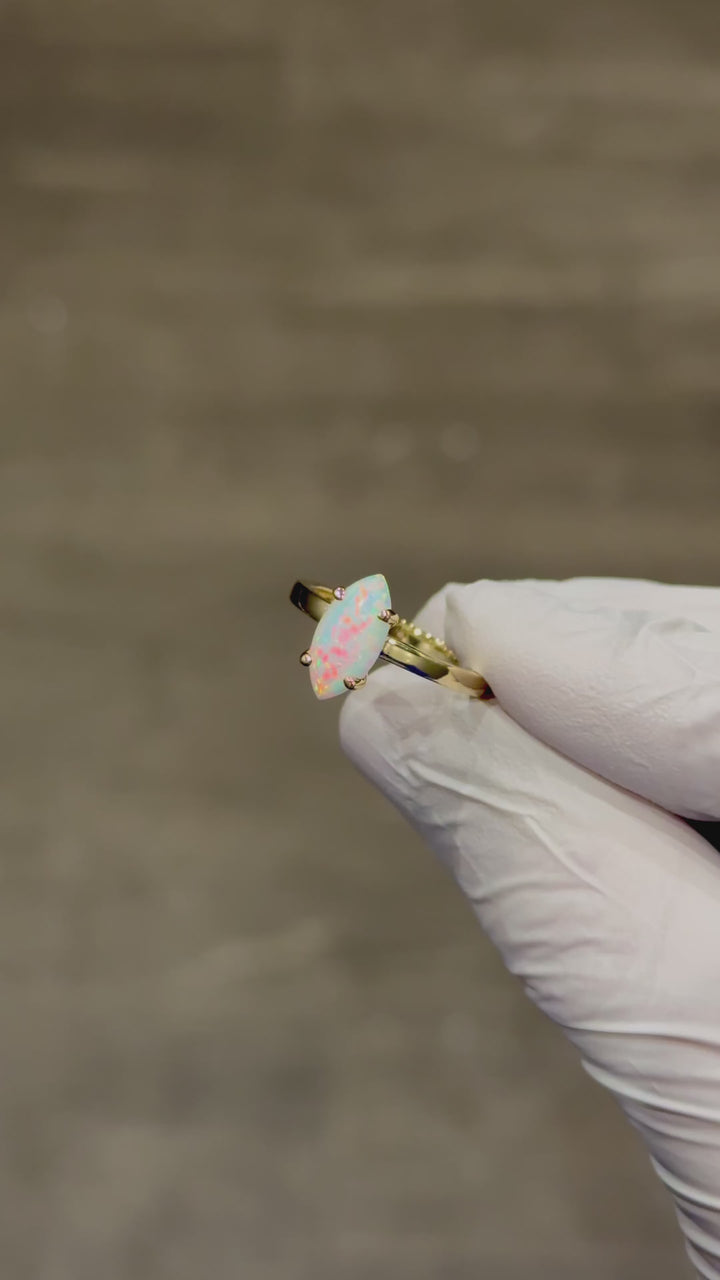 Customized™ 6x12mm, 1.70ct Marquise Cut Opal with Emerald Hidden Halo Ring in Yellow Gold
