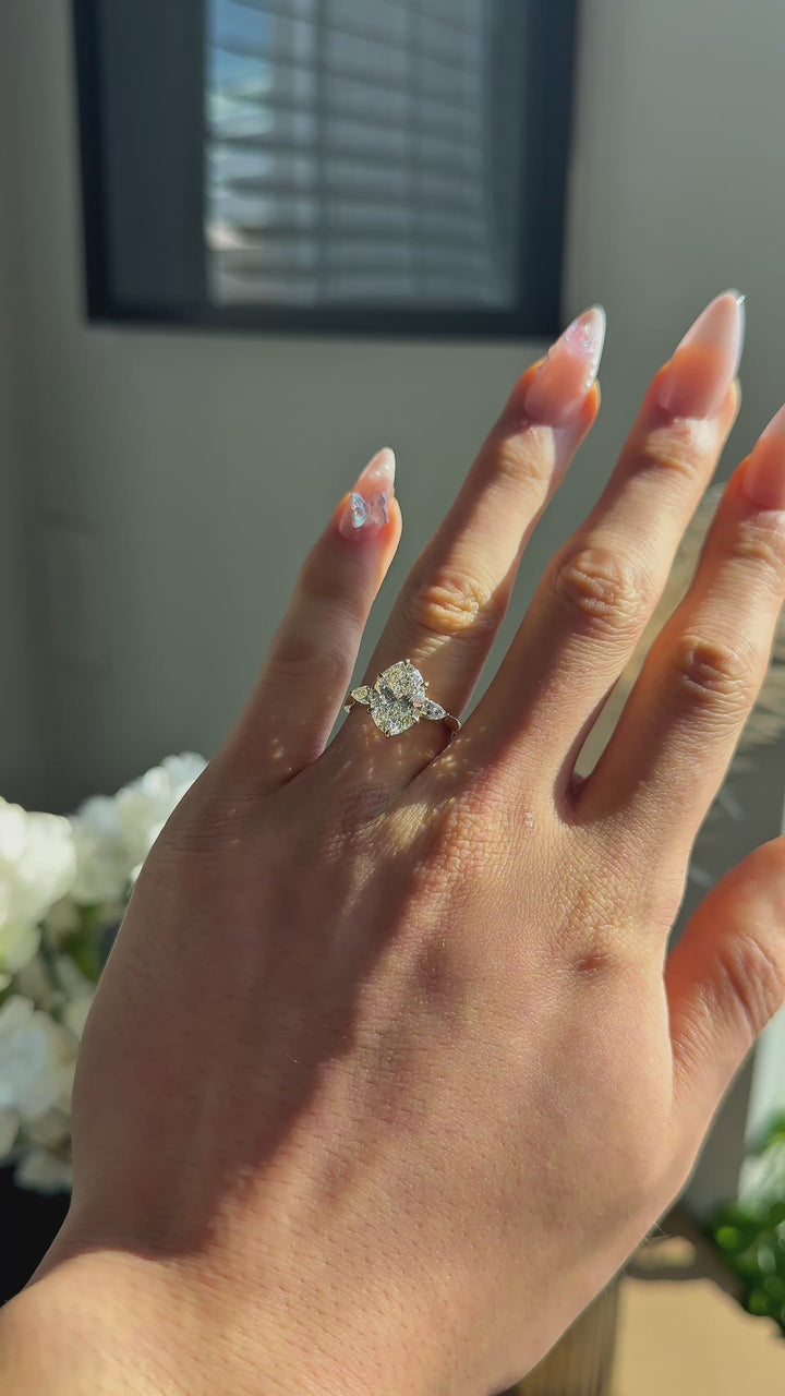 Lotus Lace Trilogy in 14K yellow gold — worn on the hand (far to close) [ld m=y shot=wear]