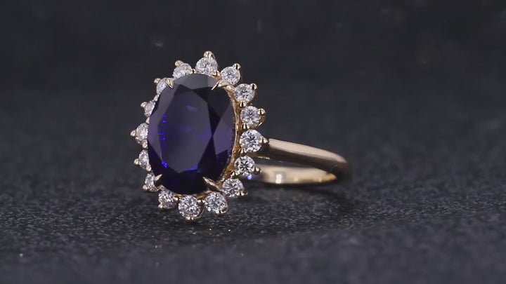 8x11mm, 5.27ct Oval Lab-Grown Blue Sapphire "Diana Setting" Ring with Diamond Halo in 14K Yellow Gold
