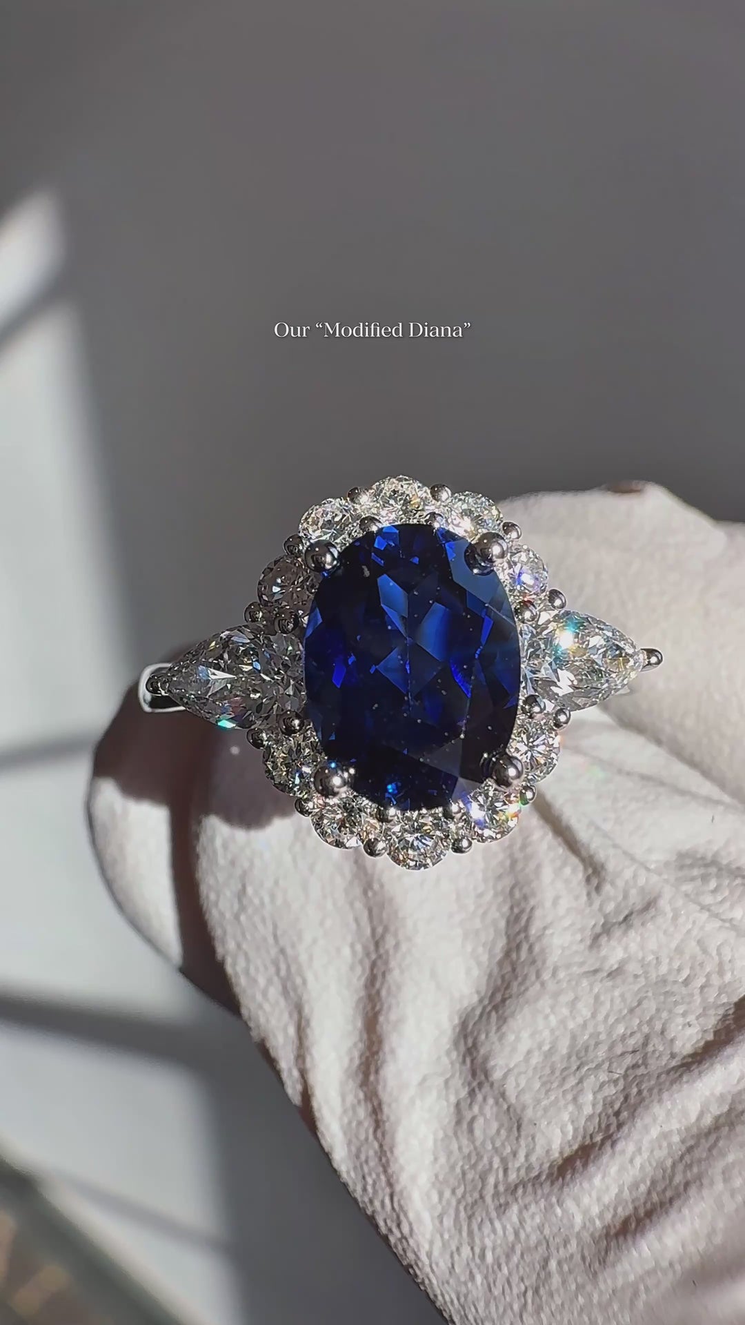 The Modified Diana — Diamond Halo Oval Blue Sapphire Ring