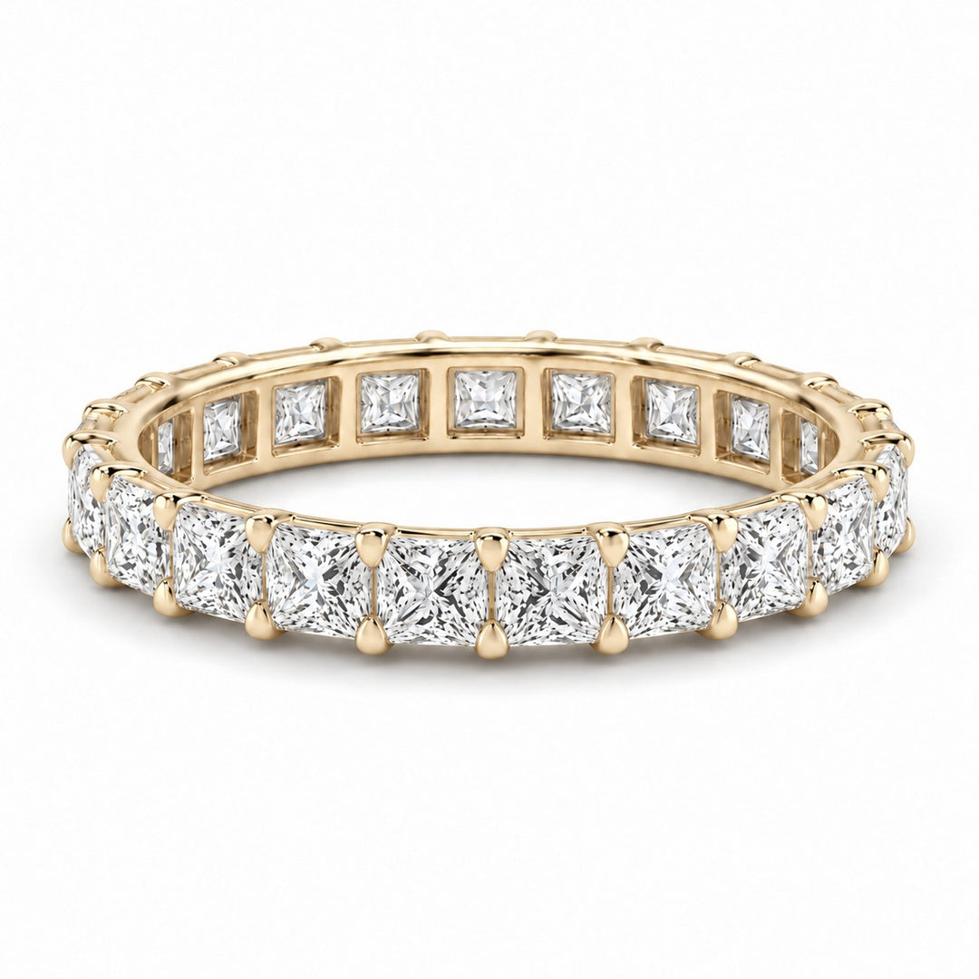 Princess lab-grown diamond eternity band, 2.5mm, 14K yellow gold, angled view