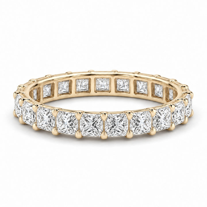 Princess lab-grown diamond eternity band, 2.5mm, 14K yellow gold, angled view