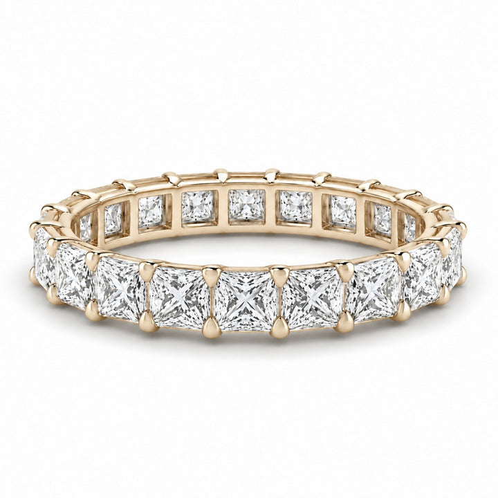 Princess lab-grown diamond eternity band, 3.0mm, 14K yellow gold, angled view