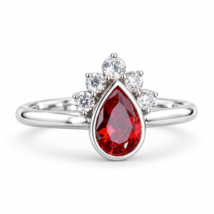 The Devotion — Pear Ruby Ring in 14K white gold, three-quarter view