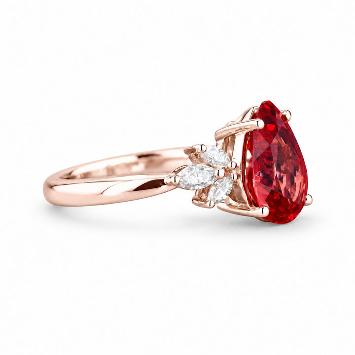 The Ember Laurel — Marquise Diamond Accent Pear Ruby Ring in 14K rose gold, side view