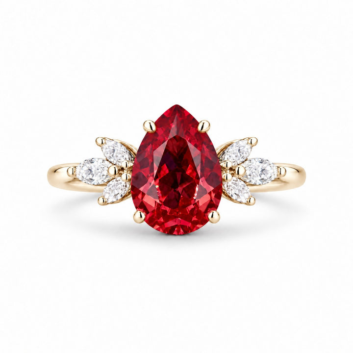 The Ember Laurel — Marquise Diamond Accent Pear Ruby Ring in 14K yellow gold, front view