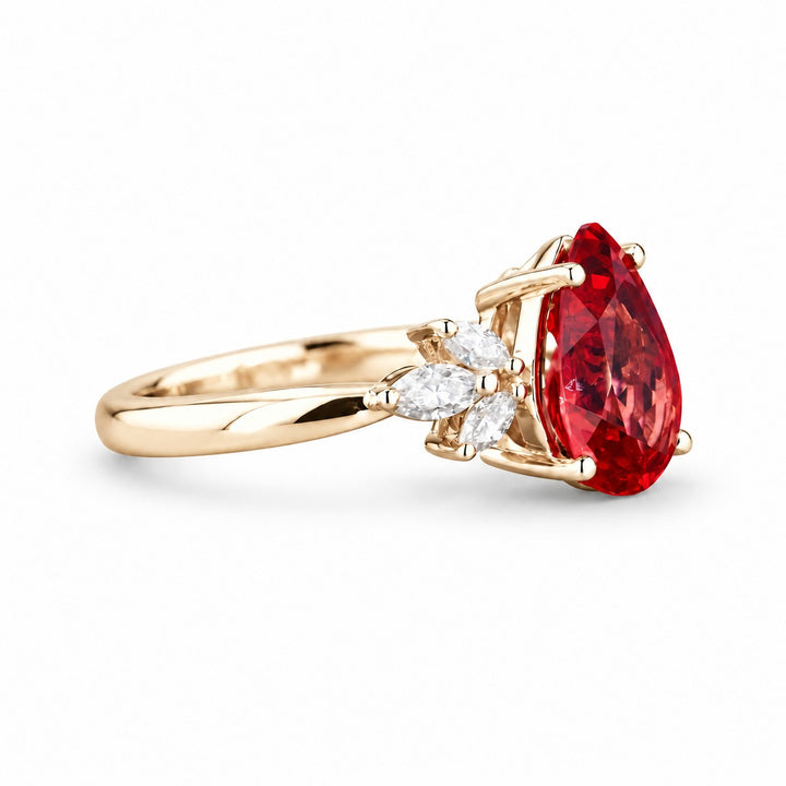 The Ember Laurel — Marquise Diamond Accent Pear Ruby Ring in 14K yellow gold, side view