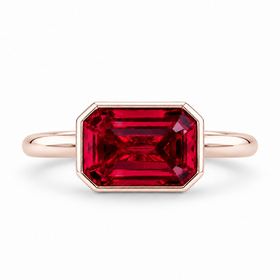 The Axis — East–West Bezel-Set Ruby Ring in 14K rose gold, front view
