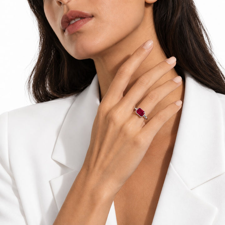 The Axis — East–West Bezel-Set Ruby Ring in 14K white gold, on the hand