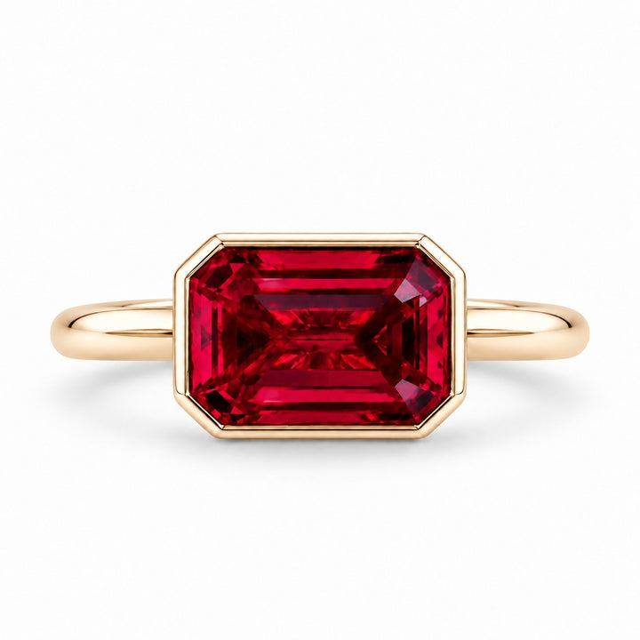 The Axis — East–West Bezel-Set Ruby Ring in 14K yellow gold, front view