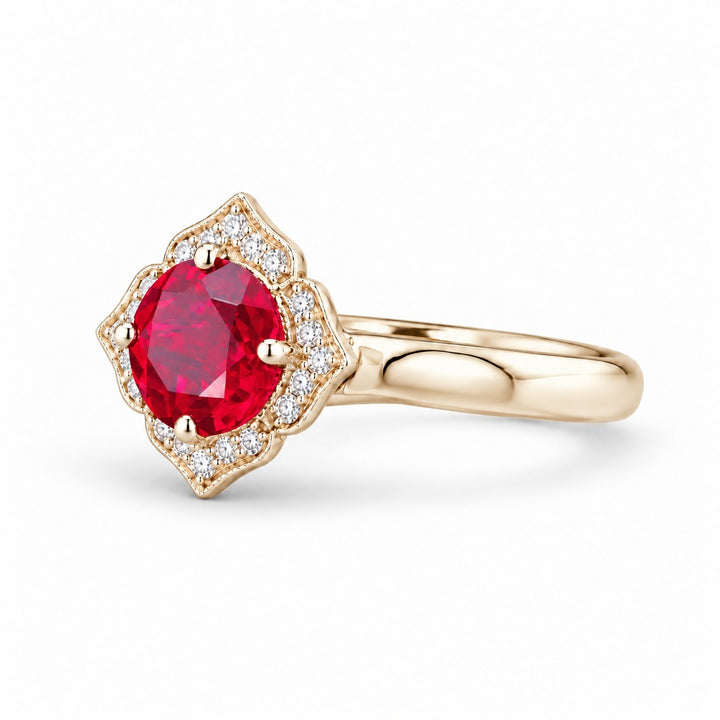 The Valencia — Vintage Diamond Halo Ruby Ring in 14K yellow gold, three-quarter view