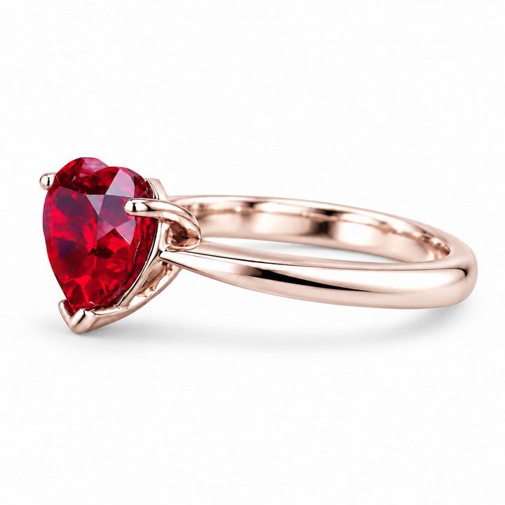 The Heart — Red Heart Ruby Ring in 14K rose gold, side view