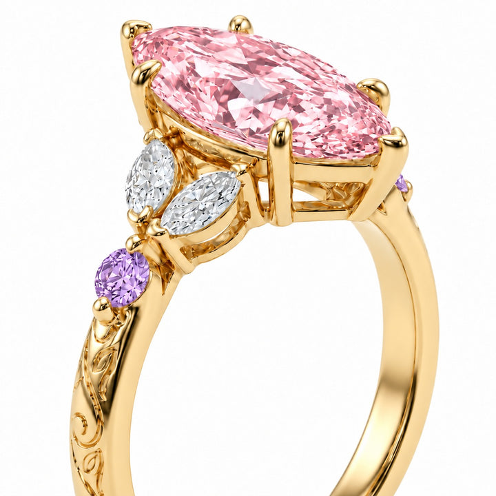 The Rapunzel with a pink lab-grown marquise diamond and amethyst accents in 14K yellow gold, setting detail
