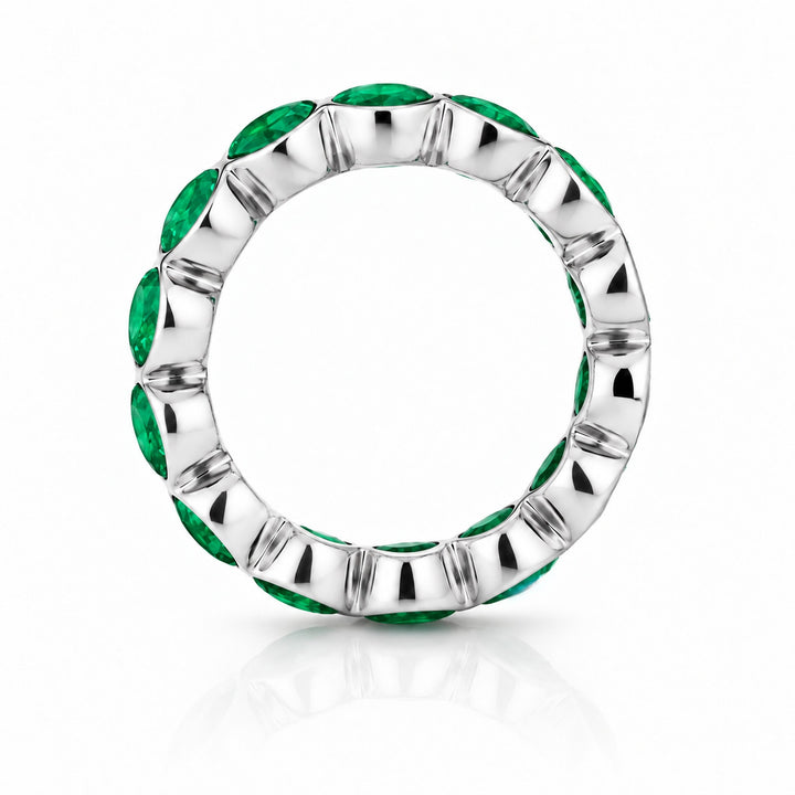 Round Colombian Emerald Bezel-Set Eternity Band in 14K white gold, profile