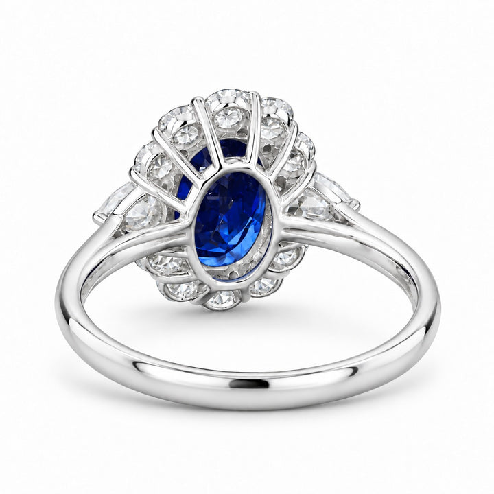 The Modified Diana — Diamond Halo Oval Blue Sapphire Ring in platinum, back view