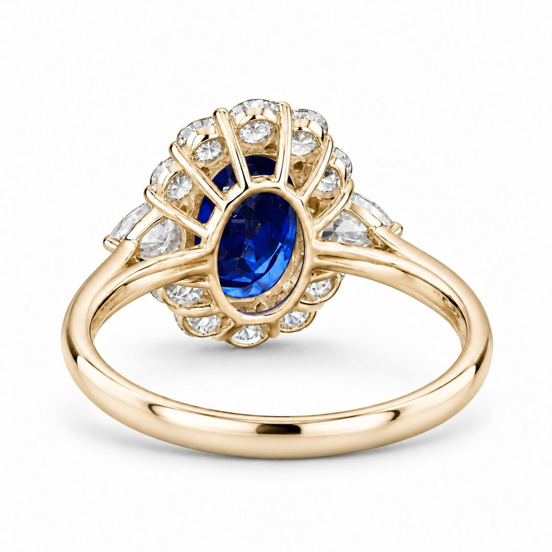 The Modified Diana — Diamond Halo Oval Blue Sapphire Ring in 14K yellow gold, back view