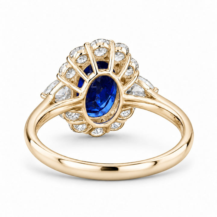 The Modified Diana — Diamond Halo Oval Blue Sapphire Ring in 14K yellow gold, back view