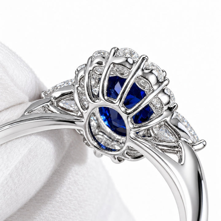 The Modified Diana — Diamond Halo Oval Blue Sapphire Ring in platinum, gallery detail