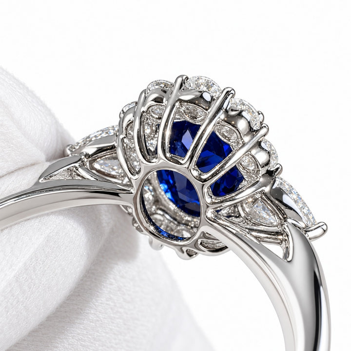 The Modified Diana — Diamond Halo Oval Blue Sapphire Ring in 14K white gold, gallery detail