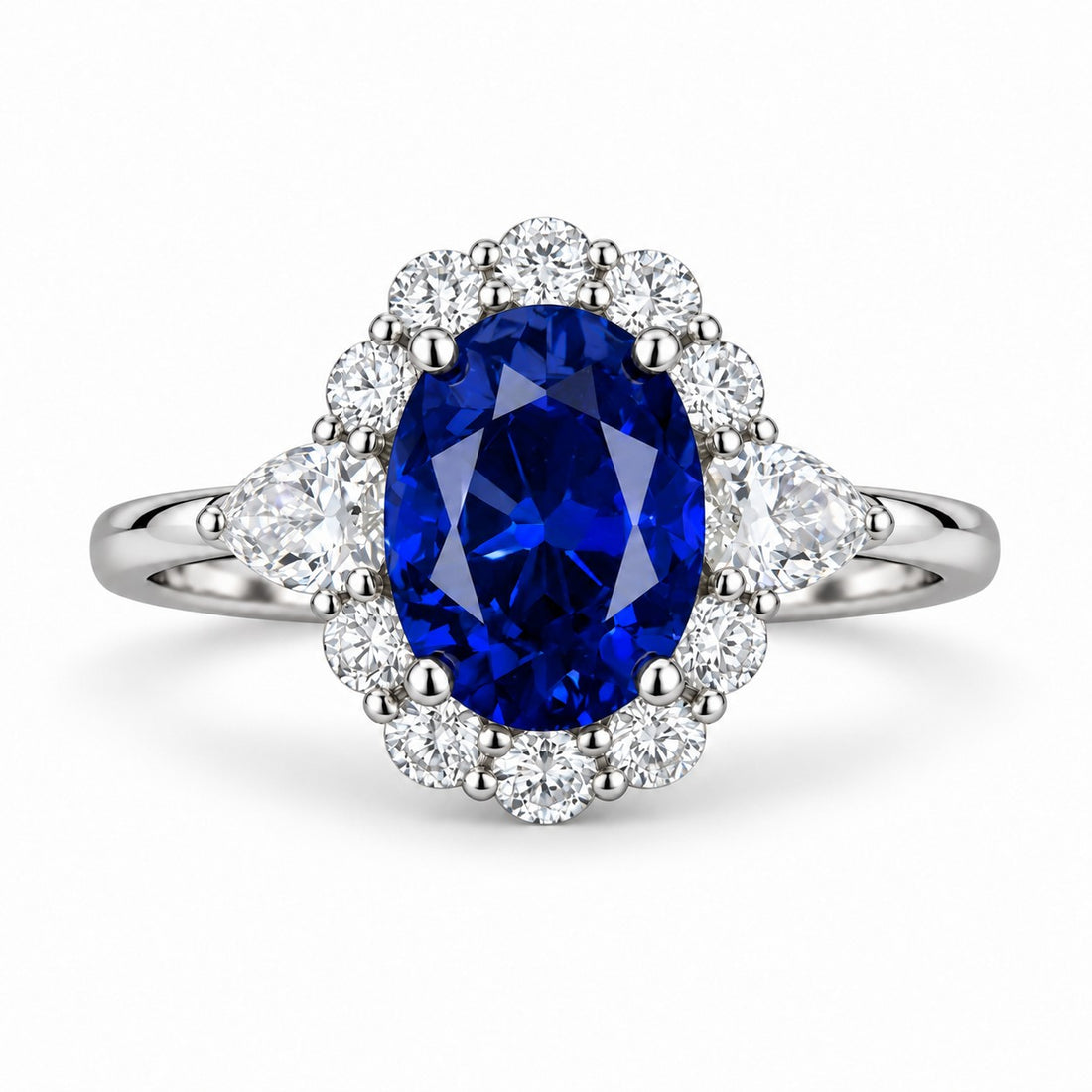 The Modified Diana — Diamond Halo Oval Blue Sapphire Ring in platinum, front view