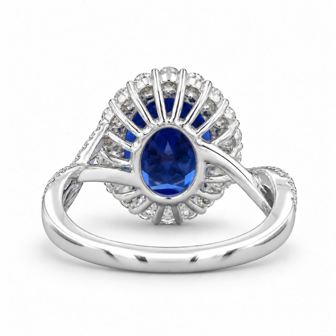 The Twisted Diana — Diamond Halo/Twist Band Oval Blue Sapphire Ring in platinum, back view
