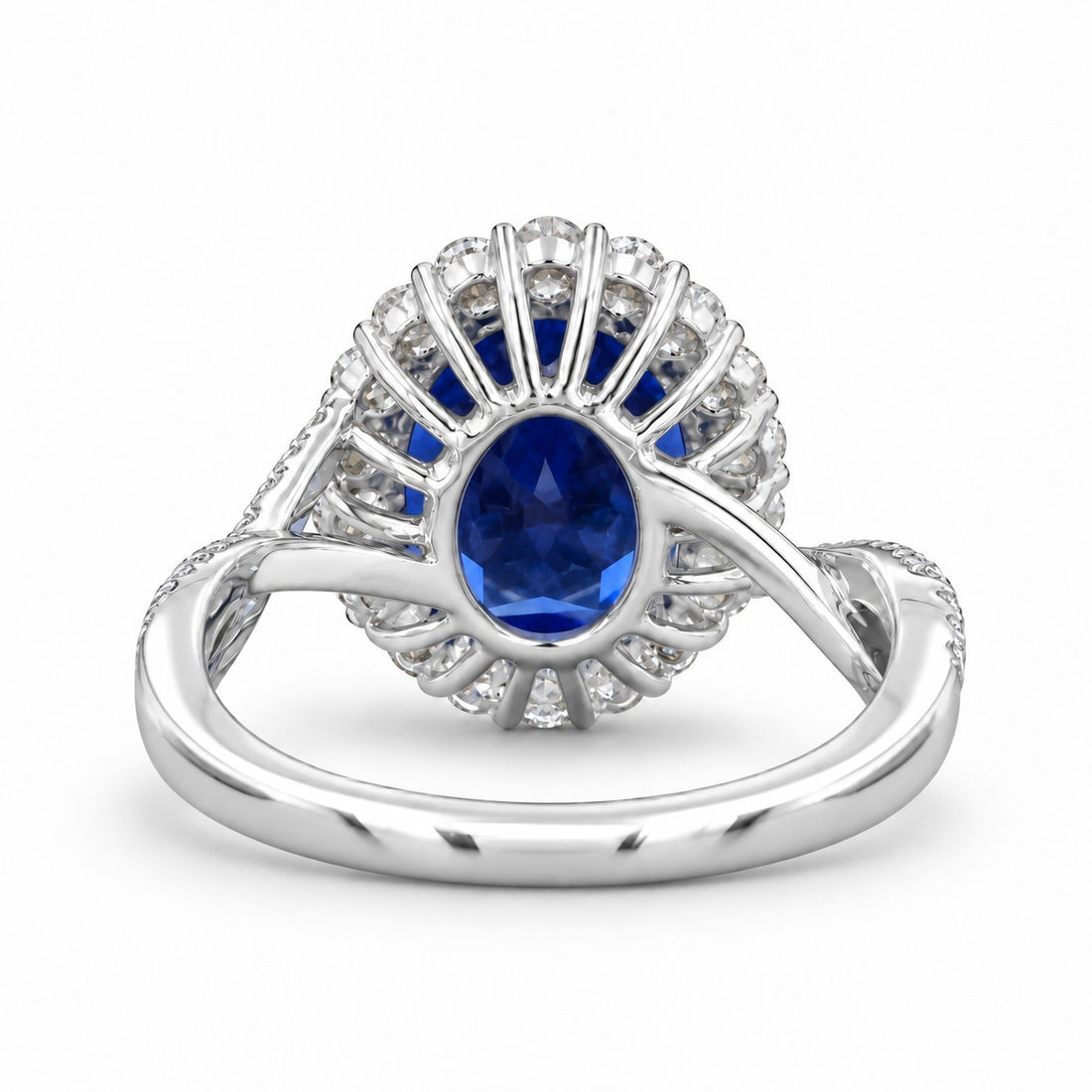 The Twisted Diana — Diamond Halo/Twist Band Oval Blue Sapphire Ring in platinum, back view