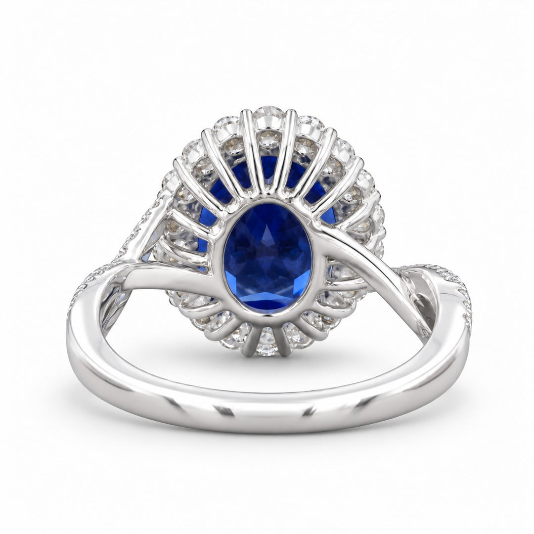 The Twisted Diana — Diamond Halo/Twist Band Oval Blue Sapphire Ring in 14K white gold, back view