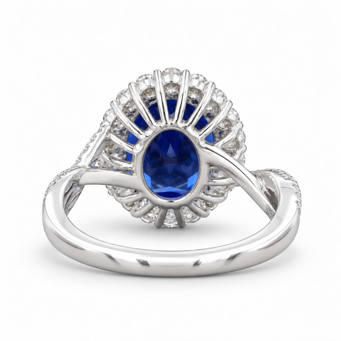 The Twisted Diana — Diamond Halo/Twist Band Oval Blue Sapphire Ring in 14K white gold, back view