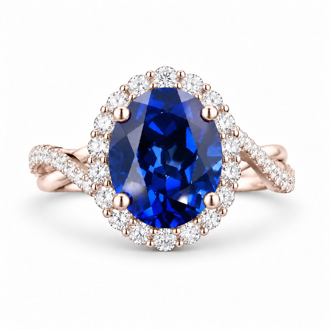 The Twisted Diana — Diamond Halo/Twist Band Oval Blue Sapphire Ring in 14K rose gold, front view
