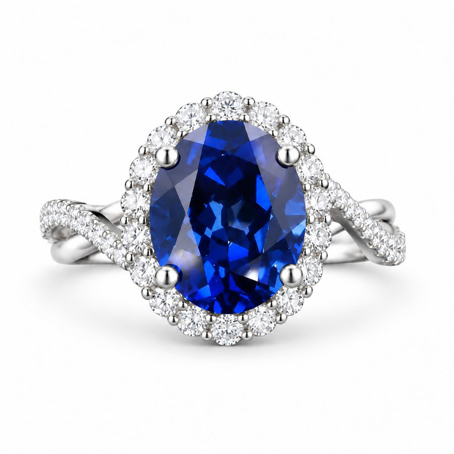 The Twisted Diana — Diamond Halo/Twist Band Oval Blue Sapphire Ring