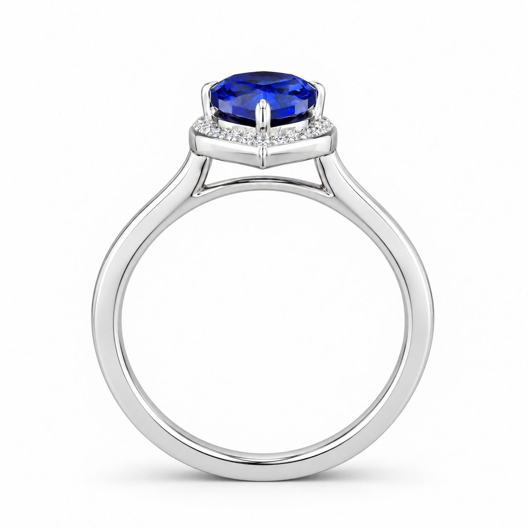 The Celestine — Blue Sapphire Halo Ring with Stacking Band in 14K white gold, profile view