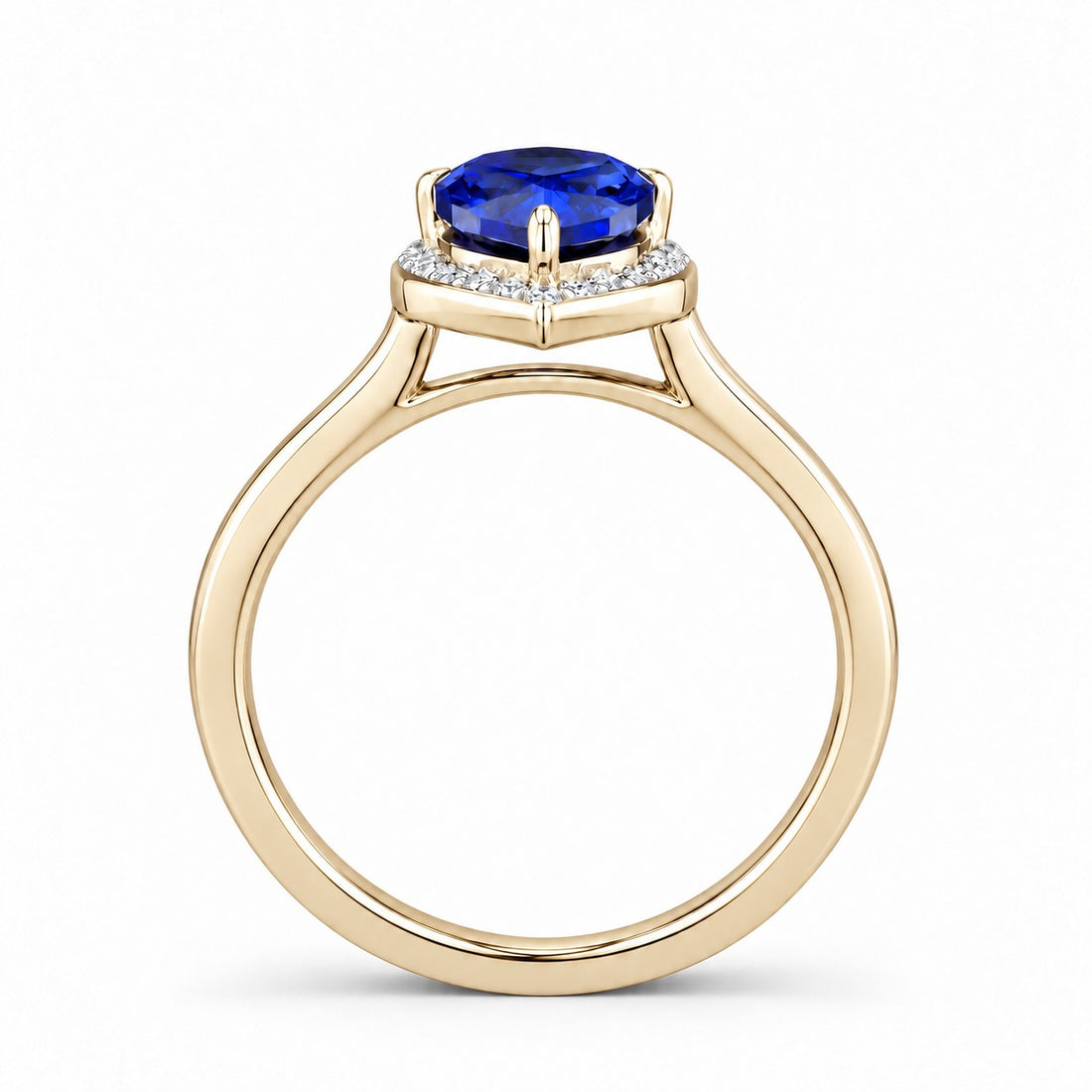 The Celestine — Blue Sapphire Halo Ring with Stacking Band in 14K yellow gold, profile view
