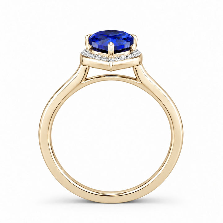 The Celestine — Blue Sapphire Halo Ring with Stacking Band in 14K yellow gold, profile view