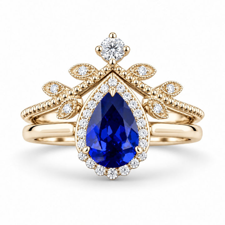 The Celestine — Blue Sapphire Halo Ring with Stacking Band in 14K yellow gold, front view