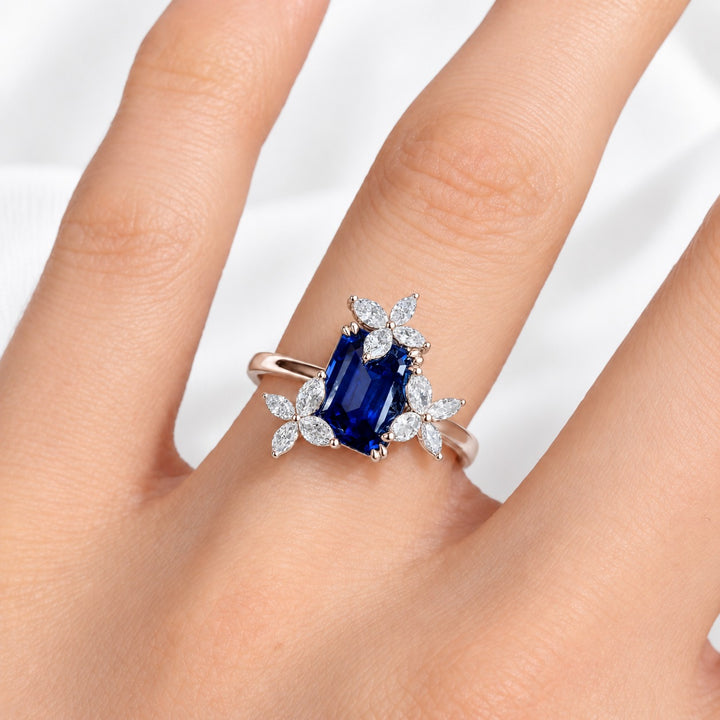 The Jardin — Emerald-Cut Sapphire Floral Ring in 14K rose gold, worn on hand